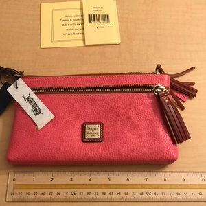 Dooney and Bourke NWT wristlet. Bubblegum pink.